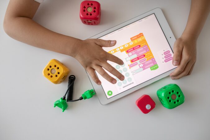 Child coding on an iPad